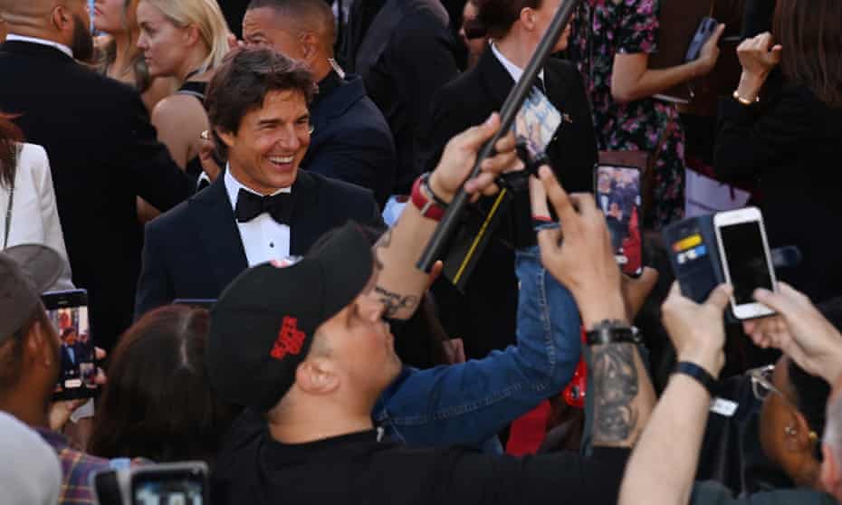 Tom Cruise surrounded by fans at the Top Gun: Maverick gala premiere