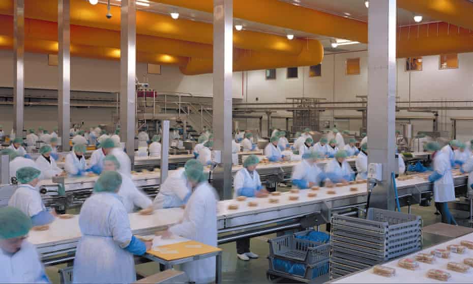 Workers make sandwiches at Greencore’s factory in Northampton
