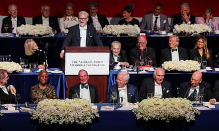 The comedian Jim Gaffigan speaks as Donald and Melania Trump attend the 79th annual Alfred E Smith Memorial Foundation dinner in New York City
