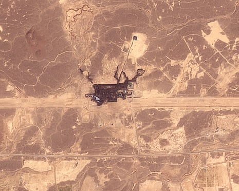 Satellite image shows a fire-damaged pipeline facility in the desert southeast of Medina, Saudi Arabia