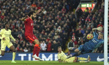 Liverpool’s Mohamed Salah scores his side’s third goal.
