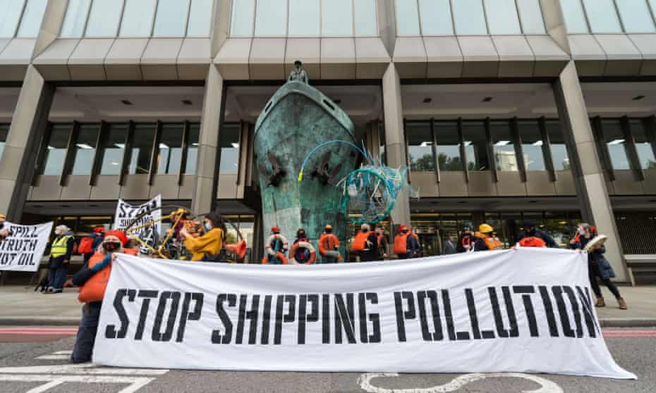 Activists from Ocean Rebellion hold a banner reading ‘Stop shipping pollution’ outside the UN’s International Maritime Organization headquarters in London in October 2020.