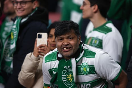 A fan of Sporting awaits kick-off. 