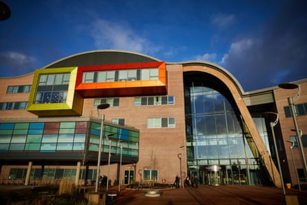 Alder Hey Children’s hospital in Liverpool, a sandstone building with yellow, red and green window features.