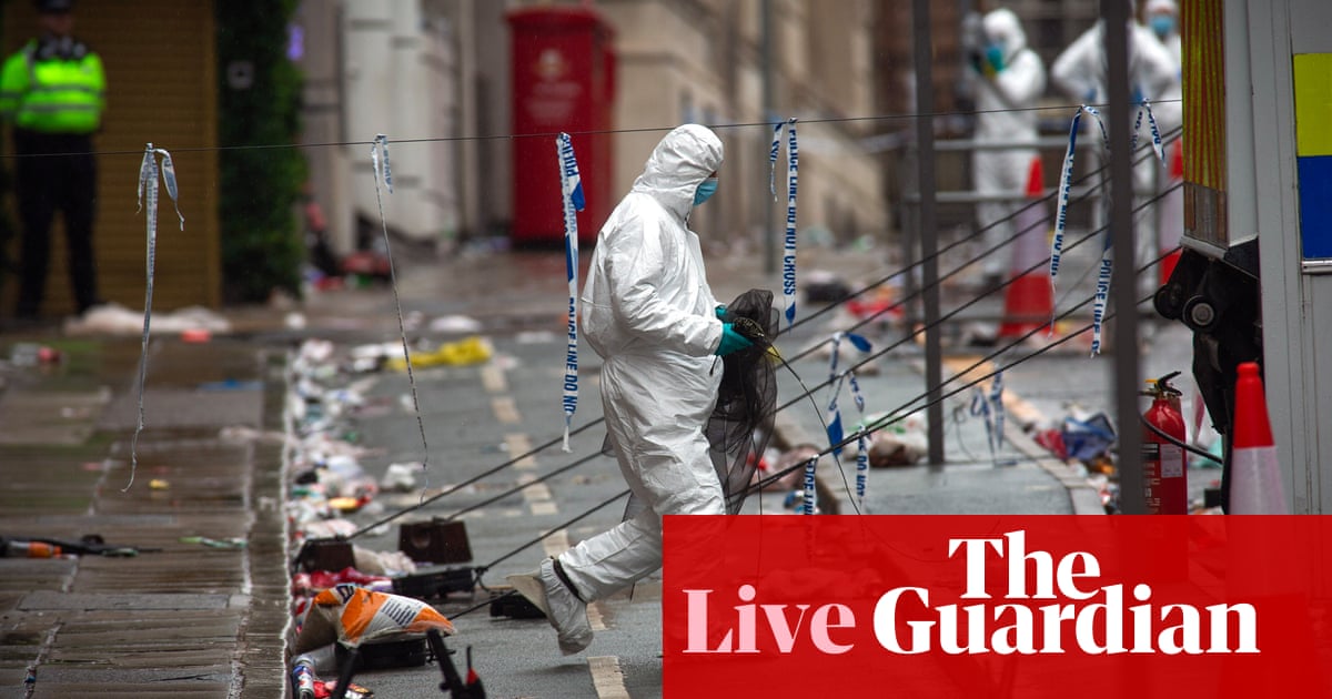 Liverpool parade collision: police continue questioning alleged driver live updates