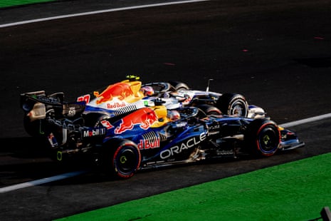 Max Verstappen and Liam Lawson’s F1 cars race side by side closely on track