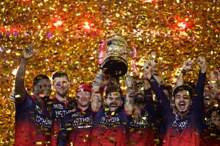 Virat Kohli lifts the IPL trophy
