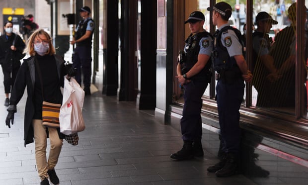 NSW police stand guard outside a hotel in Sydney on Thursday that has been declared a ‘human health response zone’.