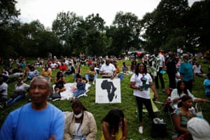 People gather at St Nicholas Park to celebrate Juneteenth in Manhattan, New York city. Juneteenth recognizes the day news of the Emancipation Proclamation reached Galveston, Texas, on 19 June 1865