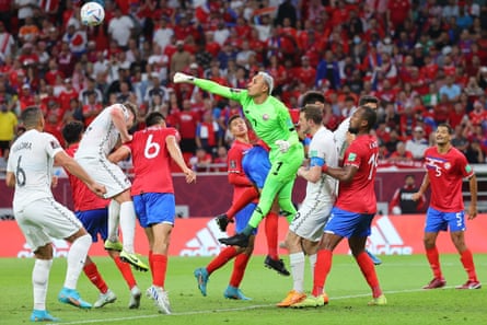 Keylor Navas takes command in a crowd penalty area during Costa Rica’s World Cup playoff win over and New Zealand.