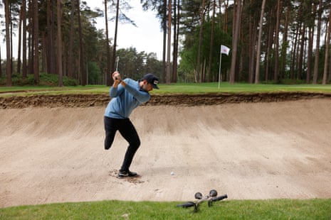 Juan Postigo Arce, a one-legged player from northern Spain, plays from a greenside bunker at the 10th green