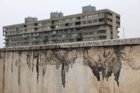 A wall covered in black soot in Tehran on 10 March 2026.