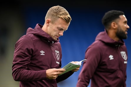James Ward-Prowse reads a programme