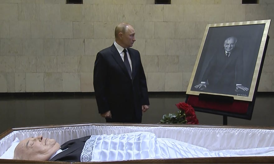 Russian President Vladimir Putin pays his final respects near the coffin of former Soviet President Mikhail Gorbachev in Moscow, Russia.