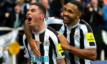 Newcastle's Miguel Almirón (left) is embraced by Callum Wilson after scoring against Tottenham