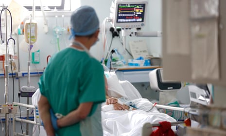 A doctor with a patient in ICU