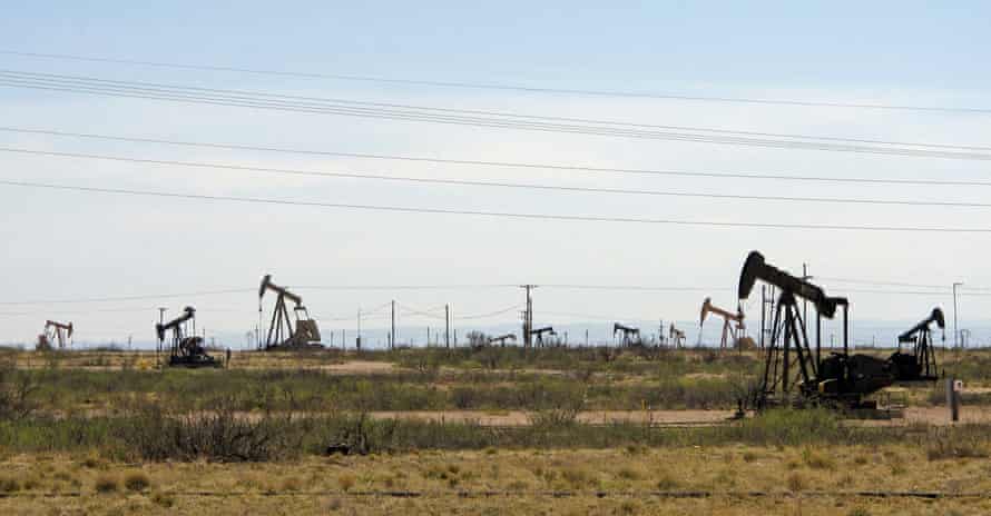 Oil rigs stand in the Loco Hills field on US highway 82 new Artesia.