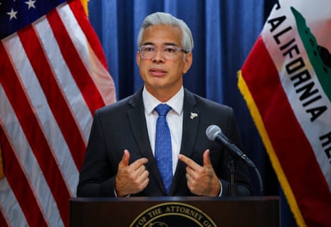 Rob Bonta, California's Attorney General, gestures with both hands while speaking at a podium