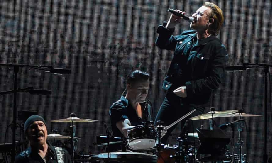 Bono, right, Larry Mullen Jr and Edge at a U2 concert in Mumbai in 2019.