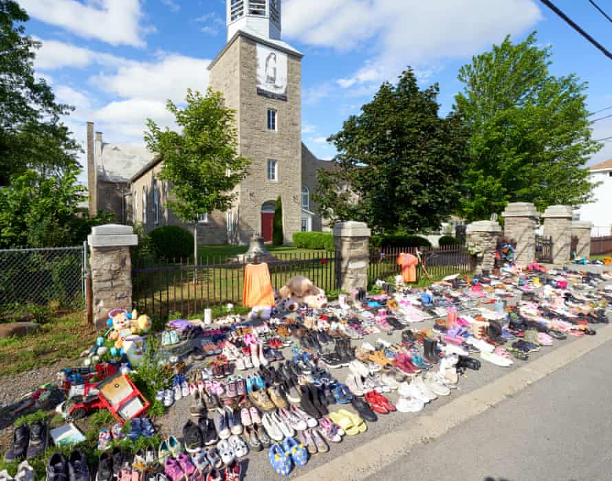 A tribute in front of the St Francis Xavier Mission, for the 215 children buried in an unmarked mass grave on the grounds of the former Kamloops Indian residential school, in Kahnawake reserve, Canada.
