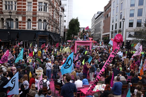 Extinction Rebellion protesters gather in Covent Garden area on August 23, the first day of the group’s latest ‘rebellion’.