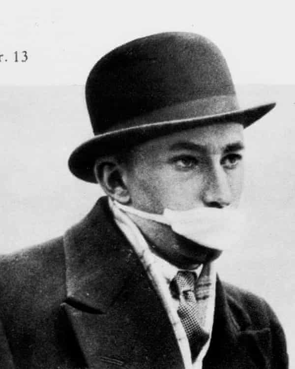 A man wears a mask during the Spanish flu of 1918.