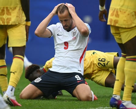 Harry Kane reacts after missing a goal opportunity