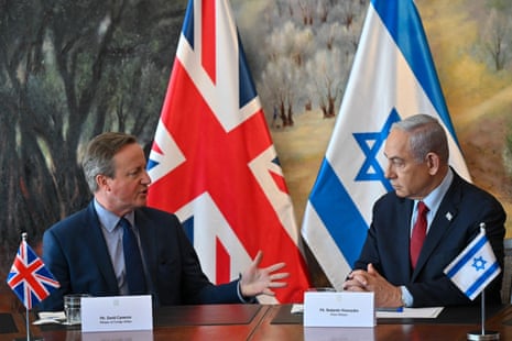 Israeli Prime Minister Benjamin Netanyahu (R) with Britain’s Foreign Secretary David Cameron during a meeting in the Knesset in Jerusalem.