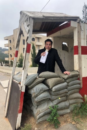 Dom Joly’s foodie tour of Lebanon | Travel 2 Dom Joly enjoys a manakish at a roadblock in Lebanon.