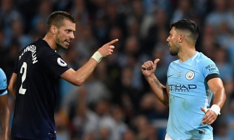 Everton’s Morgan Schneiderlin, left, accuses Sergio Agüero of play-acting after receiving a second yellow card for a tackle on the Manchester City forward.