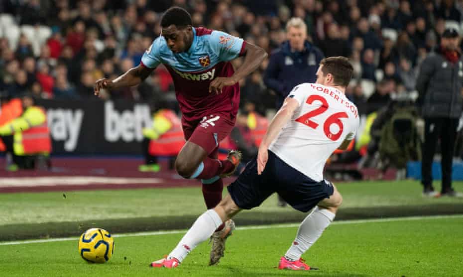 West Ham’s Jeremy Ngakia (left) takes on Andy Robertson of Liverpool in late January.