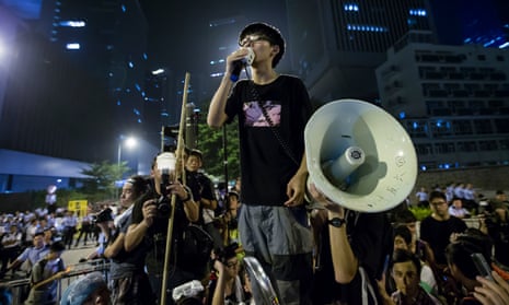 Joshua Wong addresses pro-democracy protesters during the umbrella revolution in 2014.