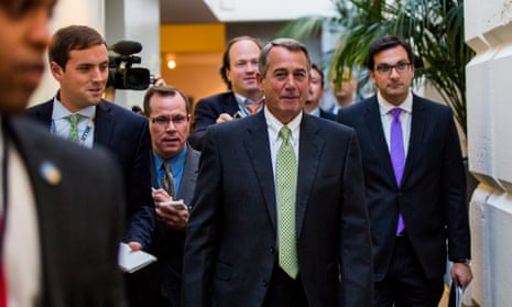 The House speaker, John Boehner, walks to a Republican meeting in the US Capitol to discuss a possible budget deal on Monday.