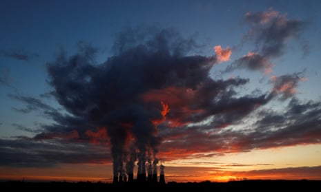 Power station with air pollution at sunset