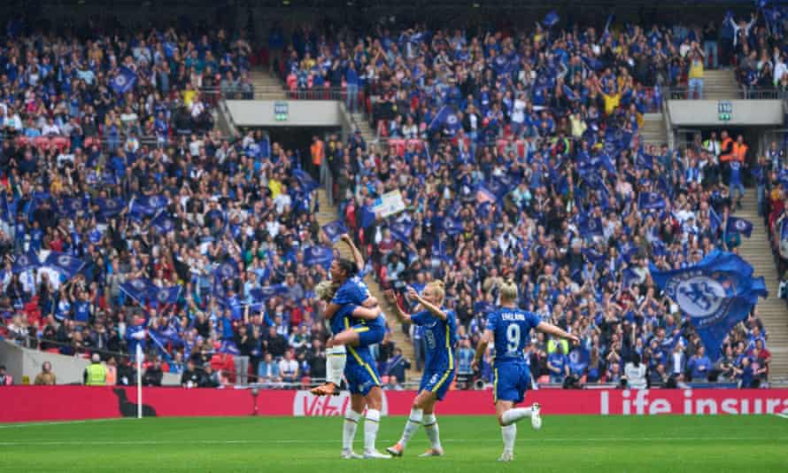 Chelsea players celebrate with Millie Bright after her cross was headed in by Sam Kerr for the opening goal of the game.