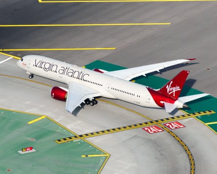 A Virgin Atlantic plane taxis on a runway