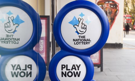 National Lottery sign outside a store in central London.