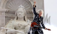 Brian May of Queen performing at Platinum Party at the Palace.