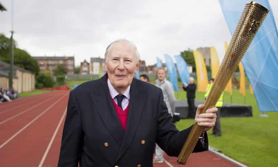 Roger Bannister carries the Olympic torch along the Iffley Road running track (now named after him) in 2012.