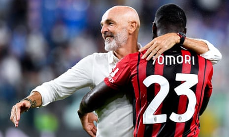 Milan coach Stefano Pioli embraces Fikayo Tomori