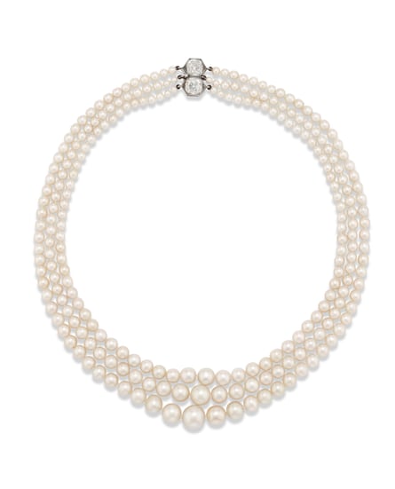 Three strands of graduated natural pearls ranging approximately from 10.50 to 3.20 mm, old-cut diamonds, 18k white gold.