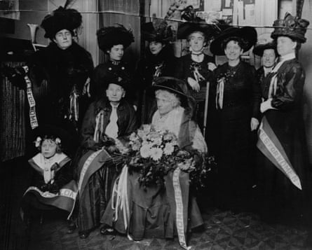 Victoria Woodhull and her sister, Tennessee Claflin in the front row, with fellow suffragists in 1910.