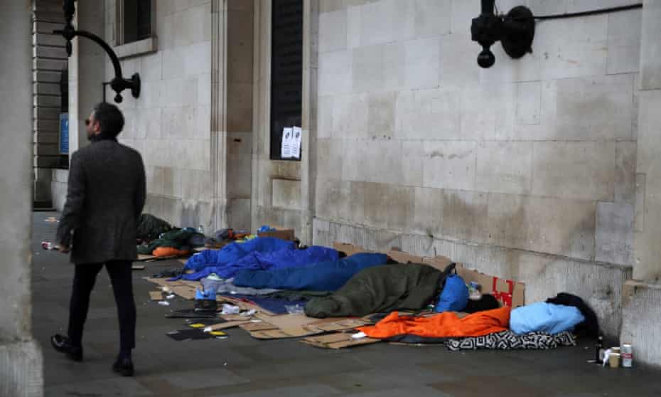 Homeless people sleeping under the portico of St  Paul’s Church in Covent Garden, London