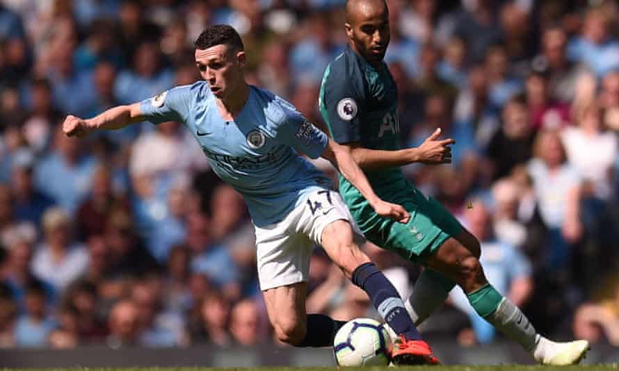 Manchester City’s Phil Foden turns away from Lucas Moura at the Etihad Stadium.