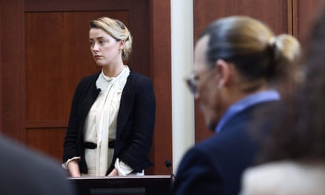 Amber Heard on the witness stand on Thursday. Her testimony, often highly charged, has been delivered while maintaining eye contact with jurors.