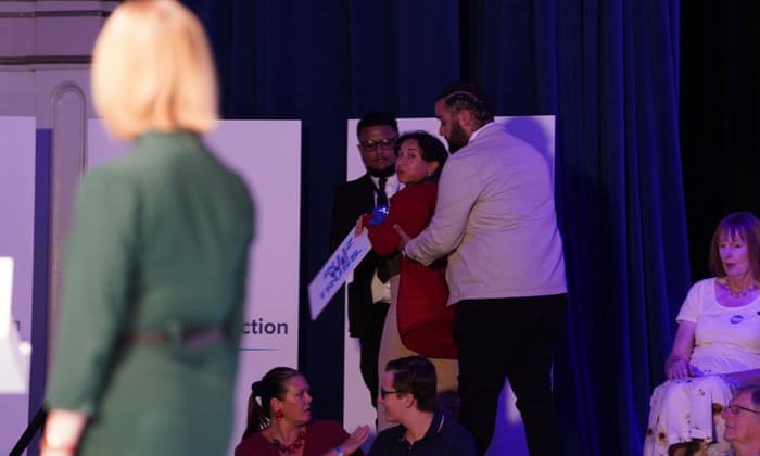 A protester interrupts Liz Truss’s speech during a hustings event in Eastbourne, as part of the campaign to be leader of the Conservative Party and the next prime minister.