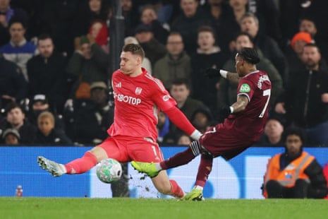 West Ham United’s Crysencio Summerville sticks the ball past Fulham’s keeper Bernd Leno to put the visitors ahead.