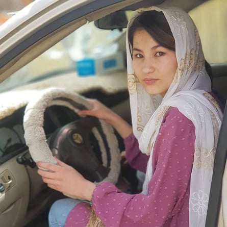 Marzia Mohammadi pictured at the wheel of a car.