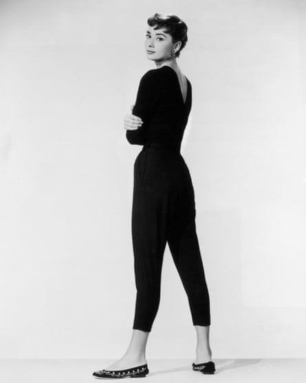 1954: Belgian-born actor Audrey Hepburn, wearing black Capri pants and a black sweater with flats, looks over her shoulder in a full-length promotional portrait for Billy Wilder’s film ‘Sabrina’. (Photo by Paramount Pictures/Getty Images)