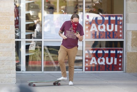 Floyd Bauler, a Travis county voter, leaves a polling station after casting his ballot in Austin.